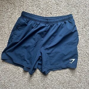 Men’s Gymshark shorts 5inch length. Good condition. Size Medium. Navy Blue.